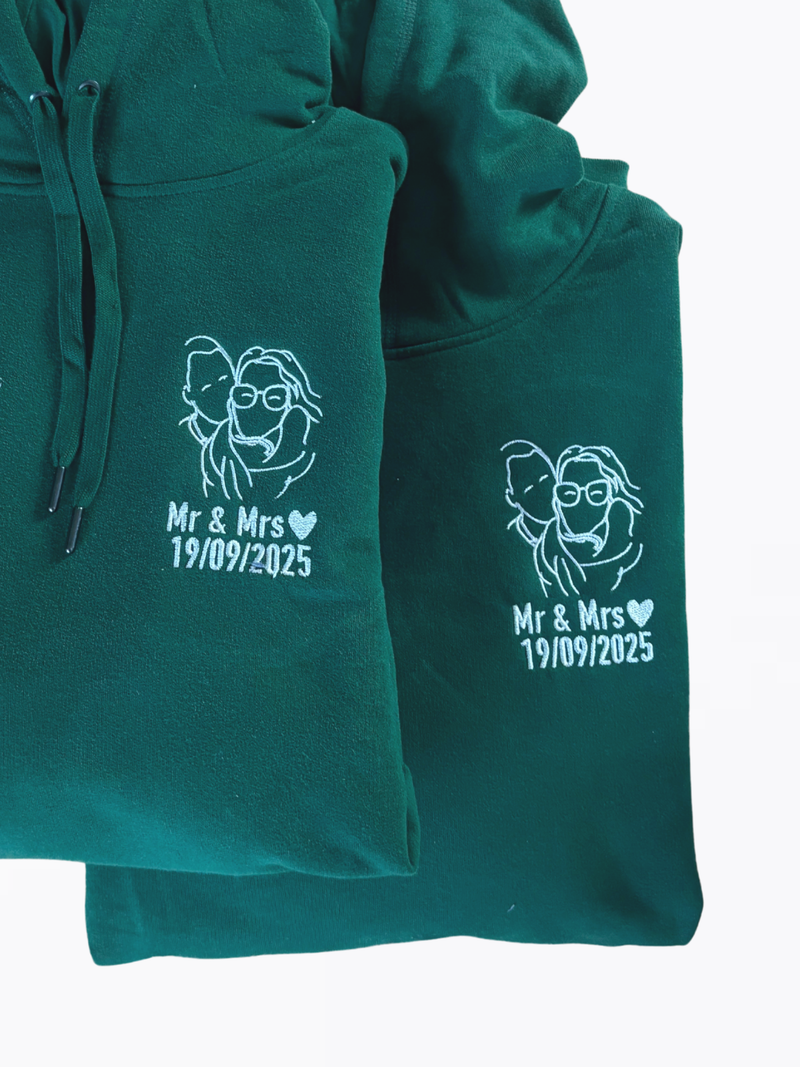 Matching koppeltruien met geborduurde lijntekening