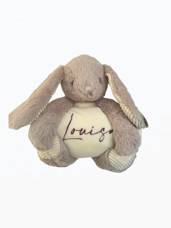 Personalized blanket with cuddly toy