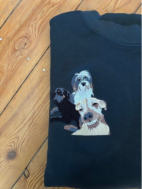 Sweater met drie ingekleurde honden