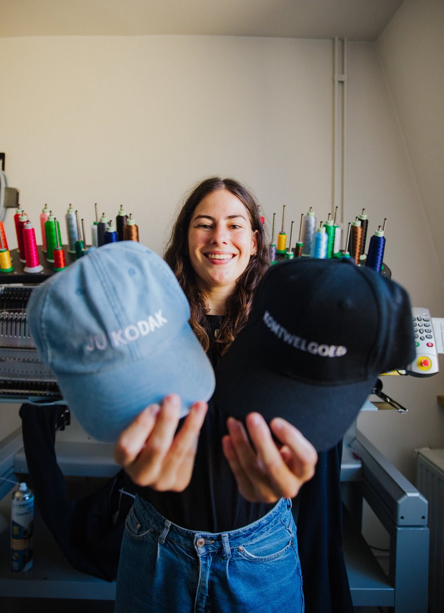 Two embroidered caps for the embroidery machine