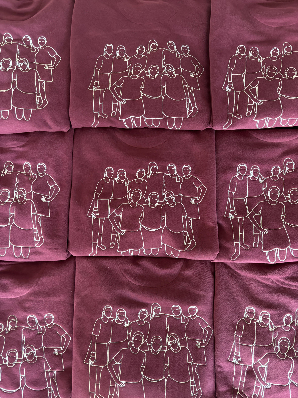 Geborduurde truien voor een team als eindejaarsgeschenk