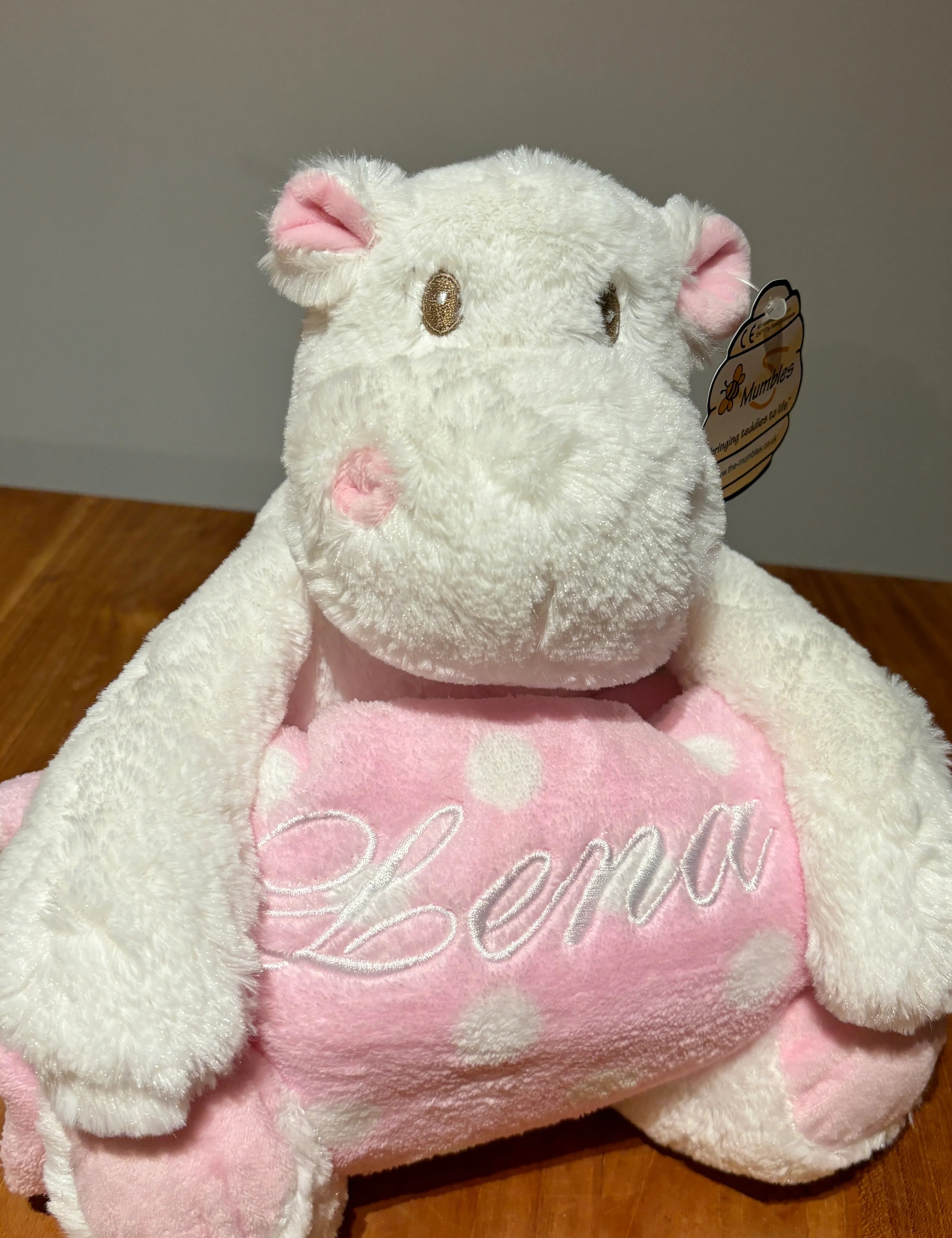 Personalized blanket with cuddly toy