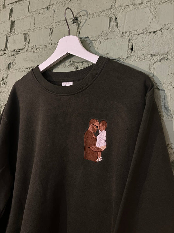 Sweater met ingekleurde foto van vader en dochter, gedragen