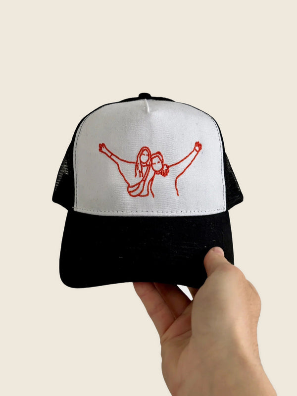 Pet 'trucker' met lijntekening